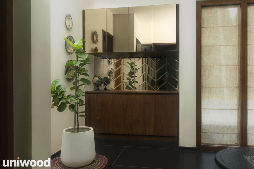 Foyer Area : Walnut Veneer ( teak ) ( Satin Finish ) + Bronze Mirror + Bronze Mirror Detailing on Teak in Walnut Veneer ( Satin Finish ) Inside Color : Canadian Walnut Brown